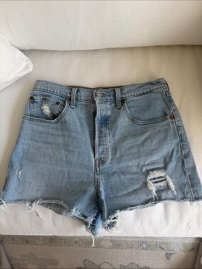 Levi’s ribcage shorts - High-Waist Light Blue Distressed Denim Shorts